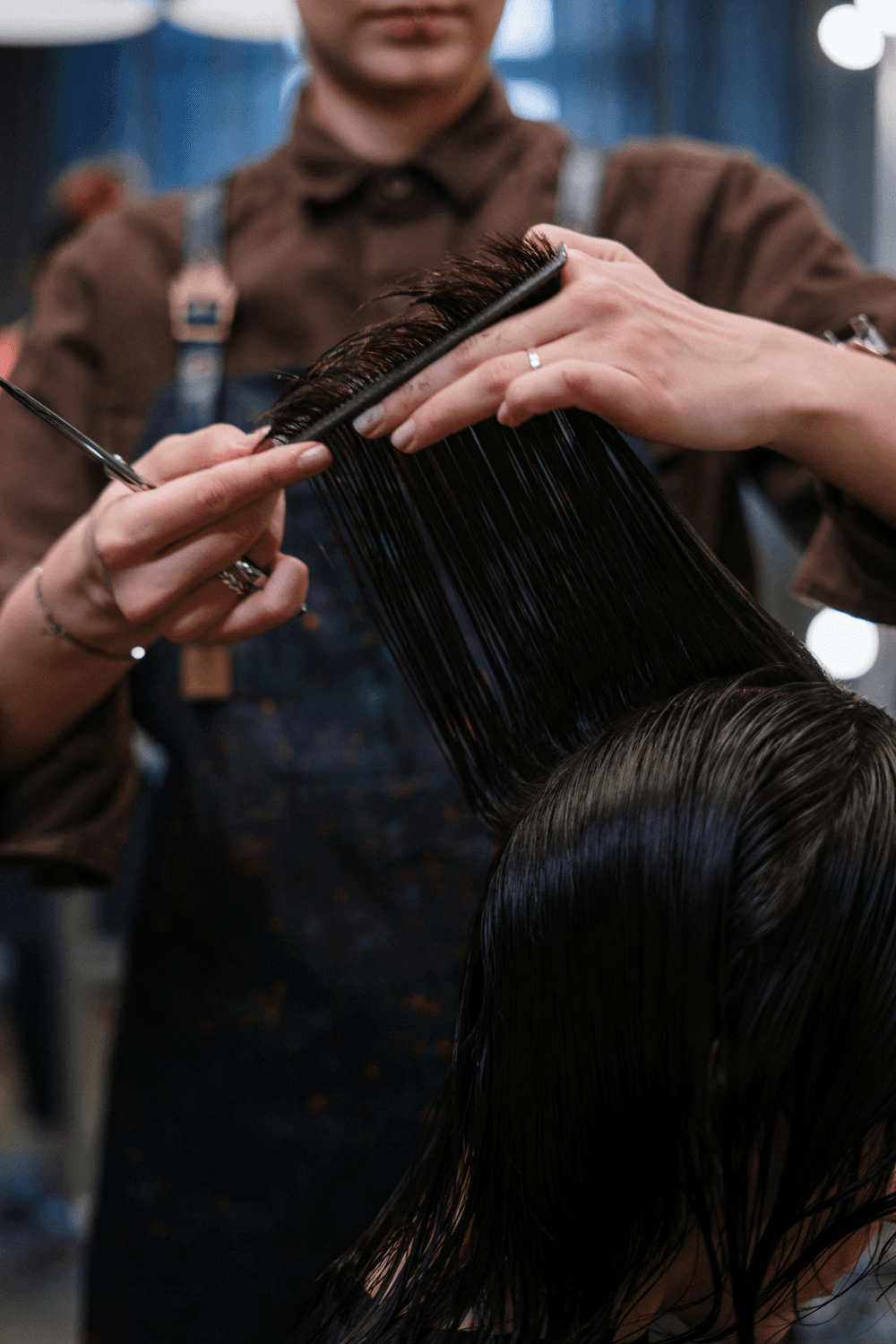 Barber working with client